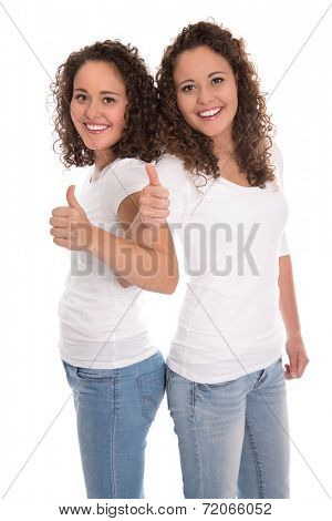 Smiling isolated girls with thumbs up: real twins.