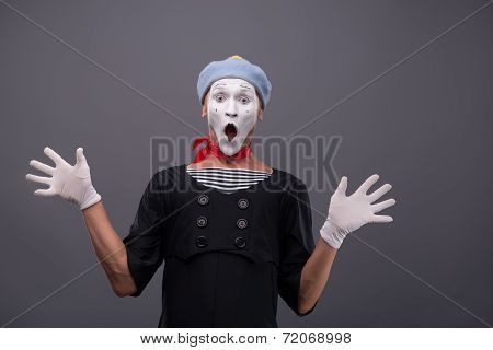 Portrait of male mime white funny face and emotions isolated on