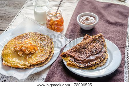 Pumpkin Crepes With Fruit Confiture And Chocolate Cream