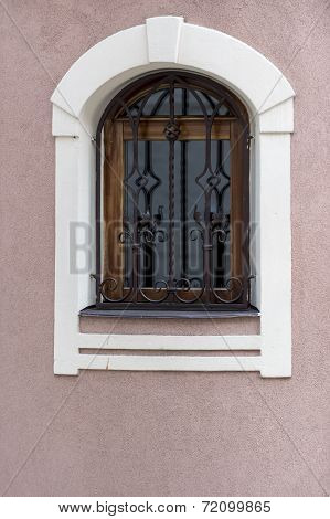old style window with steel protection
