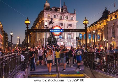 LONDON, UK - AUGUST 22, 2014: Piccadilly Circus in night. Famous place for romantic dates. Square w