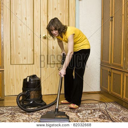 Woman With Vacuum Cleaner