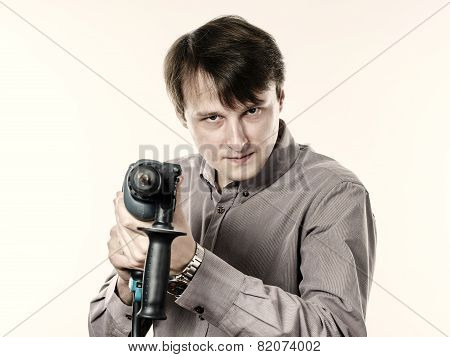 Young Man With Electric Drilling Machine Isolated On White