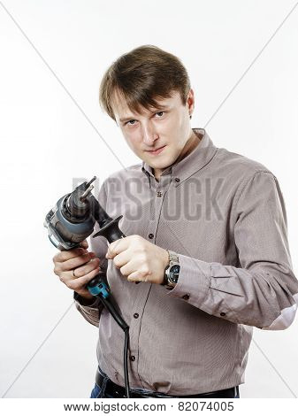 Young Man With Electric Drilling Machine Isolated On White