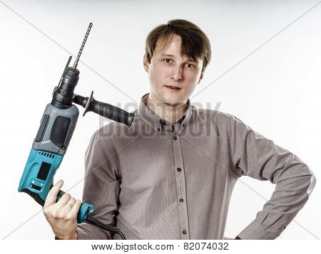 Young Man With Electric Drilling Machine Isolated On White