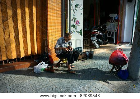 Senior Vietnamese Man, Repair Shoes