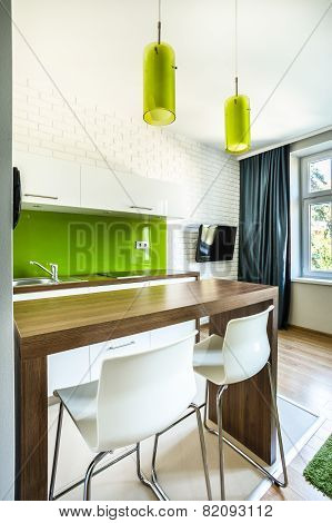 Kitchenette And Dining Space In Hotel Room