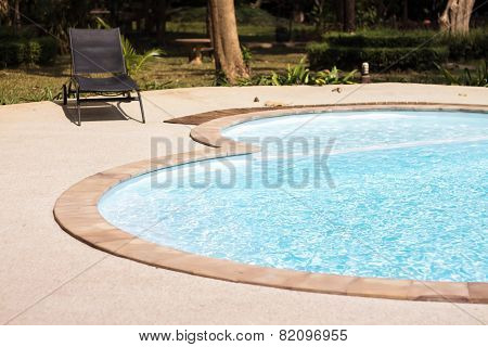 Swimming Pool With Beach Chairs