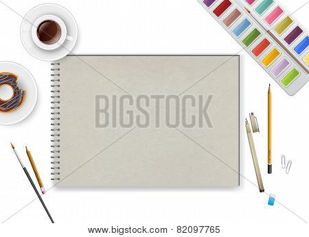 Art Workspace With Notebook And Coffee
