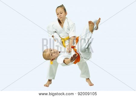 With yellow belt sportswoman is training throw