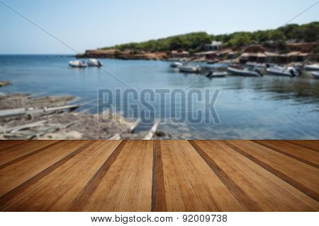 Landscape Image Of Old Mediteranean Fishing Village In Ibiza With Wooden Planks Floor