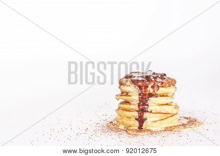 isolated stack of pancake with cocoa and chocolate