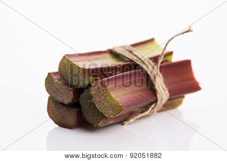 Bunch Of Fresh Rhubarb Isolated On White Background