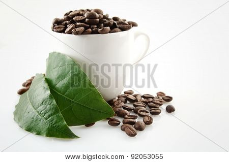 Coffee Cup Full Of Coffee Beans