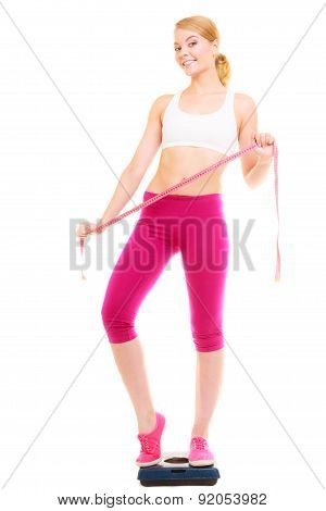 Happy Woman On Weighing Scale. Slimdown.