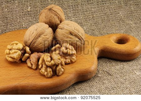Walnuts On A Wooden Board (cutting Board)