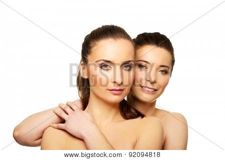 Two attractive sisters with make up.