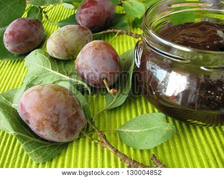 Homemade jam from plums and fresh fruits