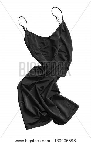 Crumpled black silk nightdress on white background