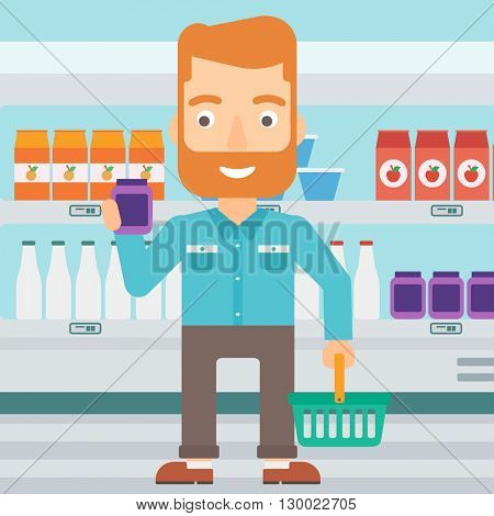 Customer with shopping basket and tube of cream.