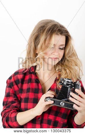 Young Woman Holding Old Retro Camera