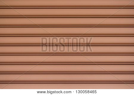 Texture of the metal gate with brown color.