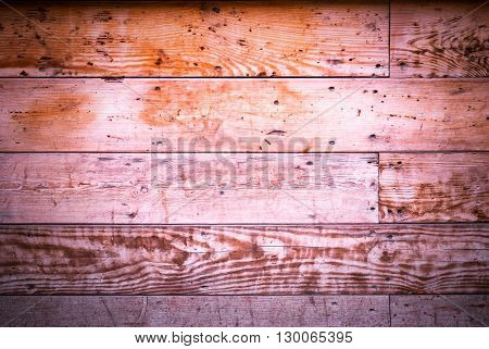 wood texture in tones of purple for a background.
