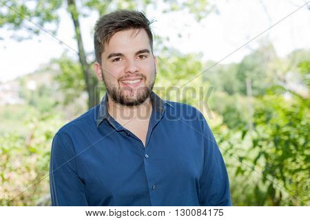 happy young casual man outdoor portrait