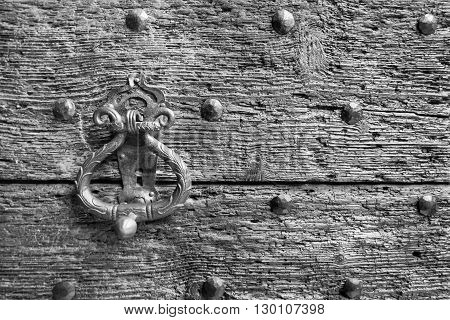 part or fragment closeup of old and ancient wooden doors or gate for the abstract textured vintage background