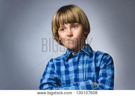 Closeup sad boy with worried stressed face expression.