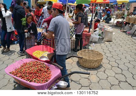 QUETZALTENANGO GUATEMALA april 28 2016 : People sale fruits in Quetzaltenango maket. This native market is the most colorful in Central America
