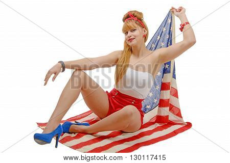 a sexy pin up girl holding an American flag.
