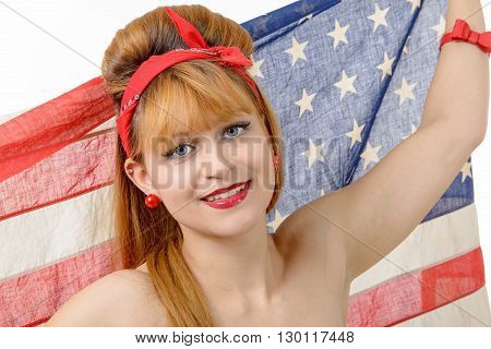 a sexy pin up girl holding an American flag.