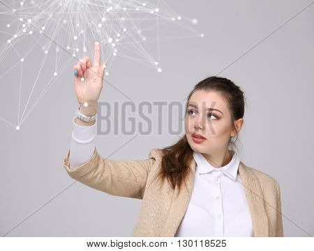 Worldwide network or wireless internet connection futuristic concept. Woman working with linked dots.
