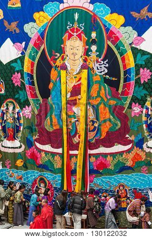 Offering Prayers To Thangka Scroll Painting