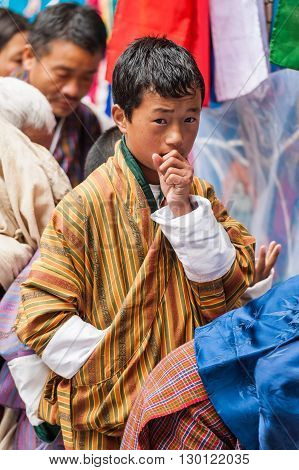 Bhutanese Boy In Traditional Costume Gho
