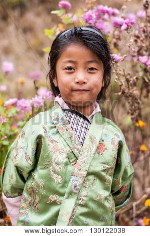 Bhuranese Girl In Colourful Traditional Costume