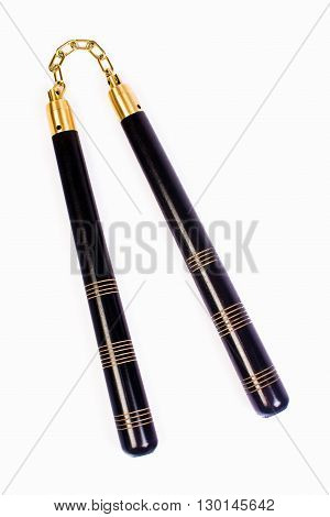 Nunchaku the traditional asian weapon is isolated on white background.