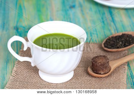 green tea with milk or hot matcha latte with cane sugar