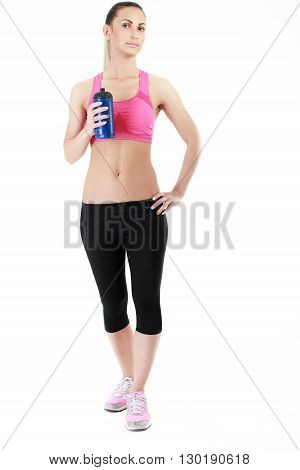 Portrait of young woman doing stretching exercise