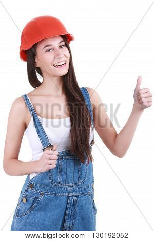 Portrait of young female builder in safety helmet on white