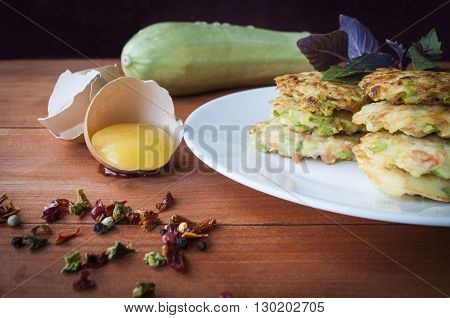 cooking vegetable dishes, zucchini and carrots,vegetarian food.