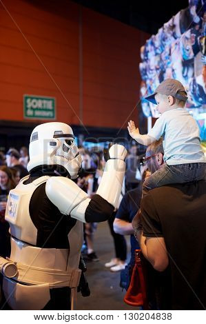 Strasbourg France - May 8 2016: Darth Vader Shaking Hand With Little Fan Boy At The Open Market Digi