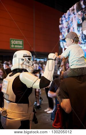 Strasbourg France - May 8 2016: Darth Vader Shaking Hand With Little Fan Boy At The Open Market Digi