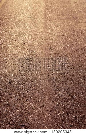 mpty asphalt roadway with sunlight, transport industry
