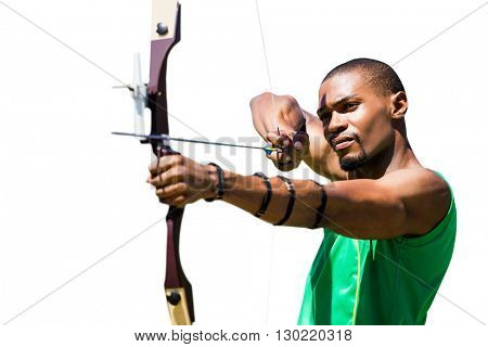 Rear view of american sportsman is posing Close up view of man practicing archery