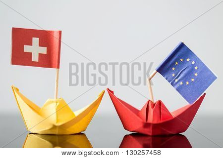 Paper Ship With Swiss And European Flag