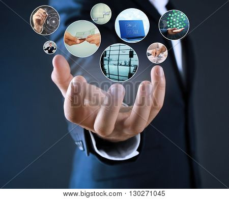 Man with preview digital business photos on virtual screen, concept of modern technology