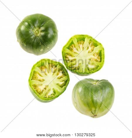 Whole and sliced green ox heart tomato, Solanum lycopersicum