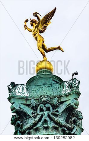 PARIS, FRANCE - MAY 31, 2015 Genie de La Liberty by Dumont Bastile Square Place de la Bastille famouse meeting place Paris France. Location of Bastile prison which was stormed and destroyed in 1789 in the Frence Revolution. July column commemorates events